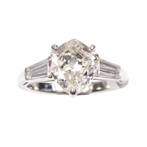 Single stone shield shaped diamond ring